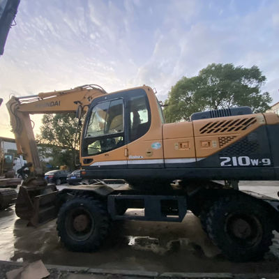 हुंडई 210W-9 प्रयुक्त पहिया खुदाई हुंडई निर्माण उपकरण 20560kg